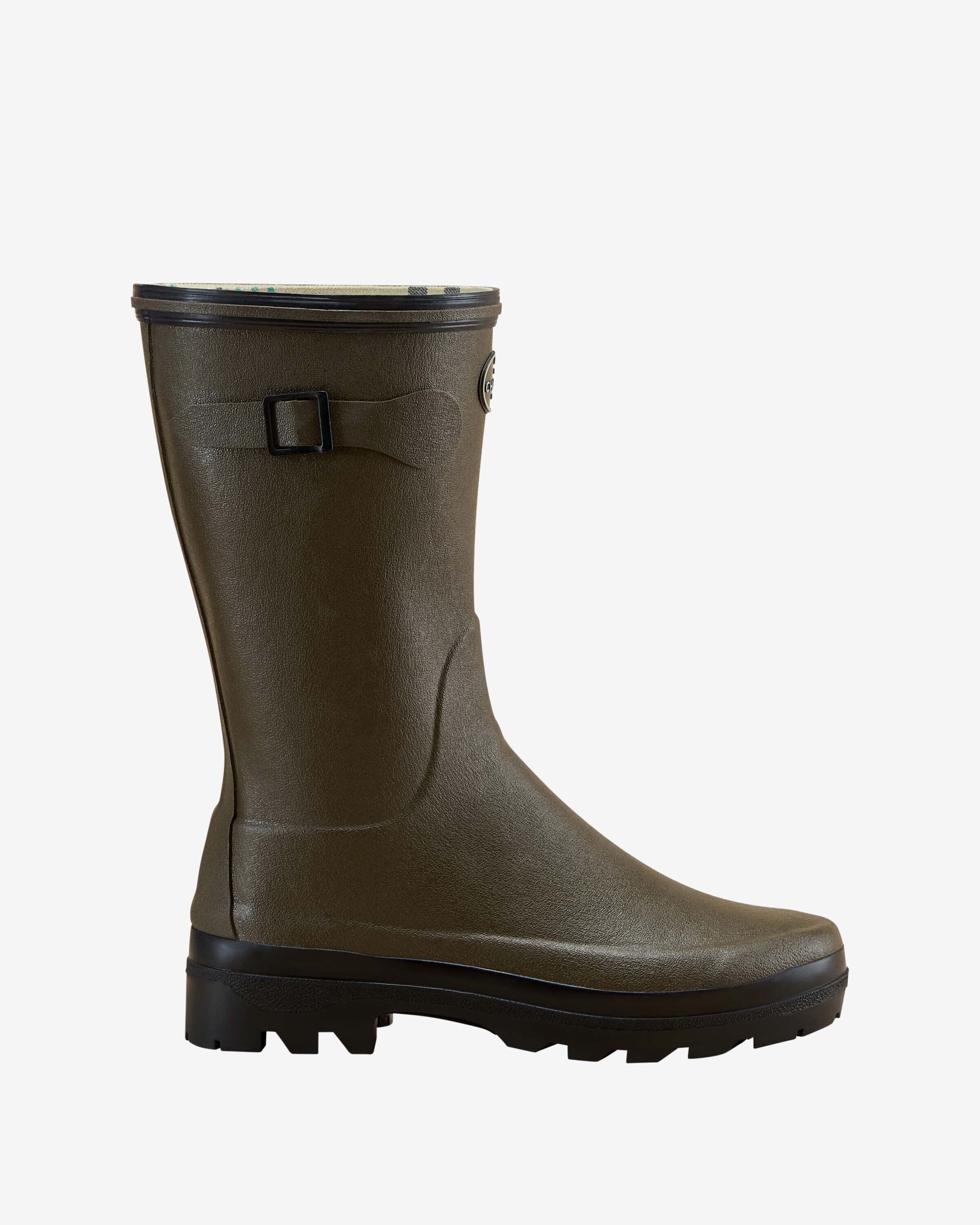 Side profile of a single Women's Giverny Jersey Lined Bottillon in Chameau Green on a white background. The boot features a matte texture, black sole with rugged tread, a decorative side buckle, and the brand’s logo near the top.