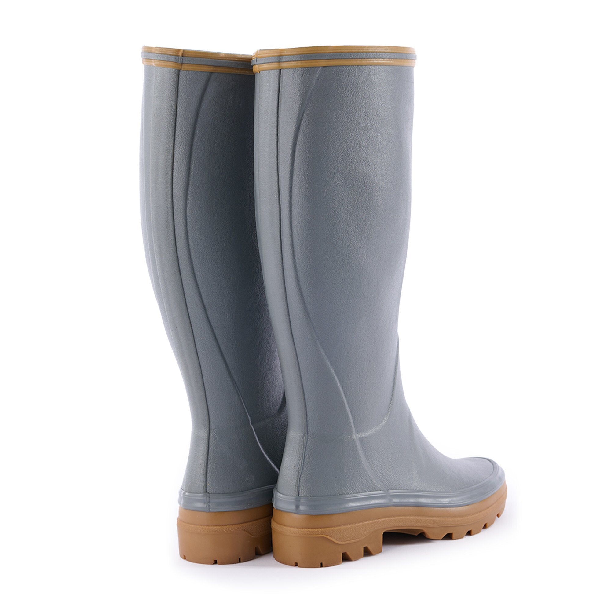 Rear three-quarter view of a pair of Women's Giverny Jersey Lined Wellington Boot in Grey, emphasizing the contoured and supportive shape of the heel and shaft. The boots are light gray with tan soles and a subtle rear seam design. The durable rubber material and precise construction are clearly visible.