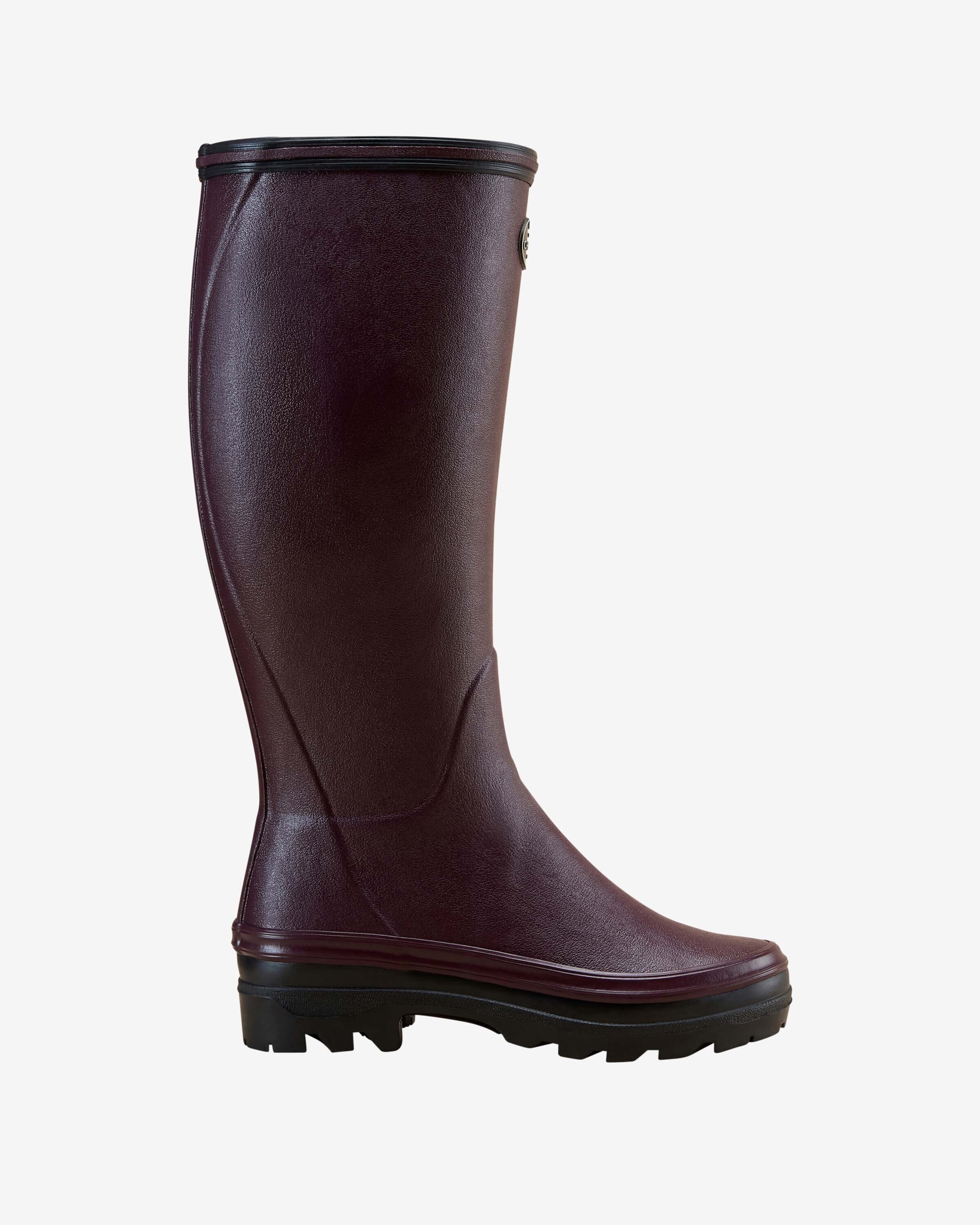 Side profile of a single Women's Giverny Jersey Lined Wellington Boot in Cherry Red, shown against a white background. The boot features a rich wine-red rubber exterior with a matte finish, a black lugged sole, and a rounded toe.