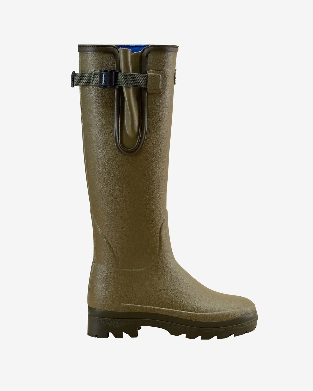 A pair of Women's Vierzonord Neoprene Lined Wellington Boot in Iconic Green colorway worn by a model. The boots feature a slightly matte olive-toned rubber exterior, a distinctive tightening strap with a snap-fastening buckle, and Le Chameau's signature oval logo badge on the outer shaft. The model wears the boots with off-white trousers tucked in, highlighting the tall shaft and rugged tread.